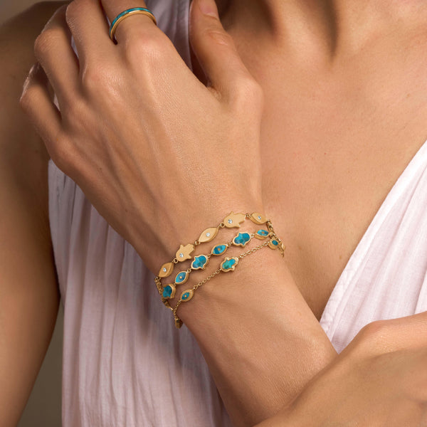 Abundant Clarity Turquoise Multi-Symbol Gold Bracelet